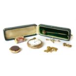 A cased single stone diamond stick pin,