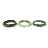 Three jade bangles,