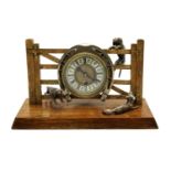 An Edwardian oak brass and silvered hunting gate clock,