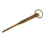 A wooden carding distaff,