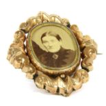 A Victorian gold photo locket,