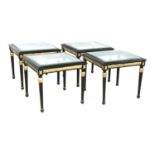 A set of four French design ebonised occasional tables,