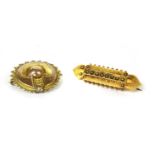 Two Victorian Etruscan revival style brooches,