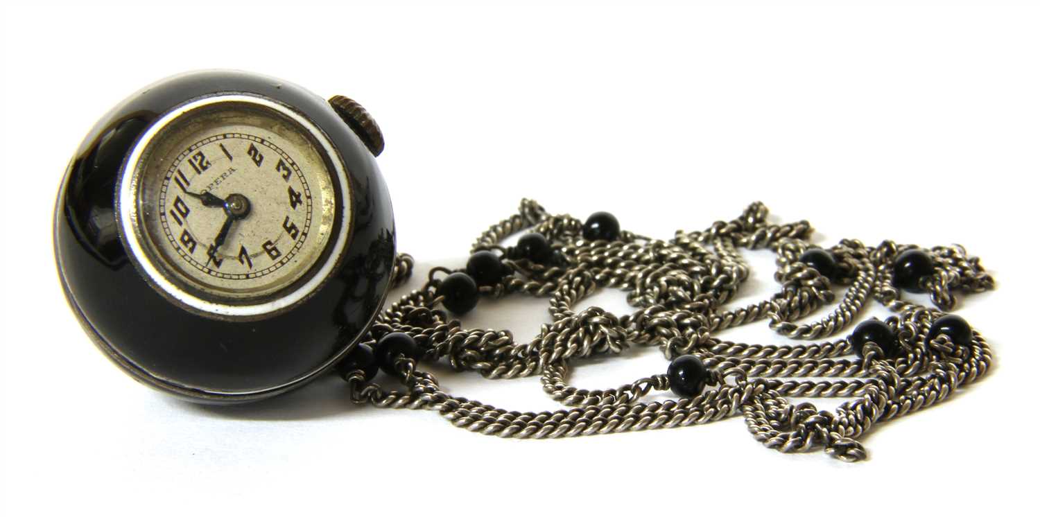 A silver enamel globe mechanical pendant watch,