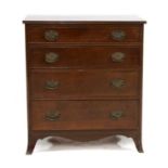 A small mahogany chest of four drawers