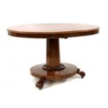A Victorian mahogany circular pedestal dining table,