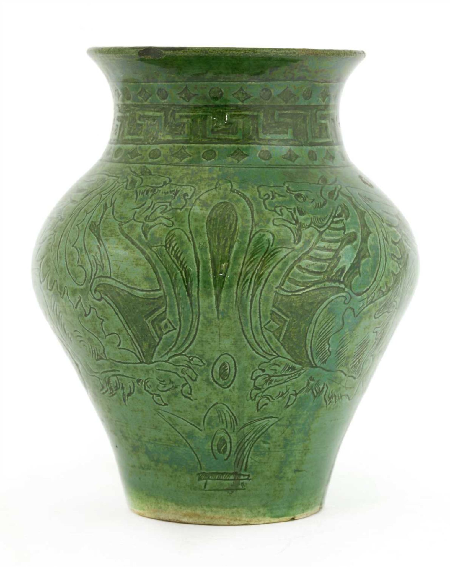 A green-glazed pottery vase,