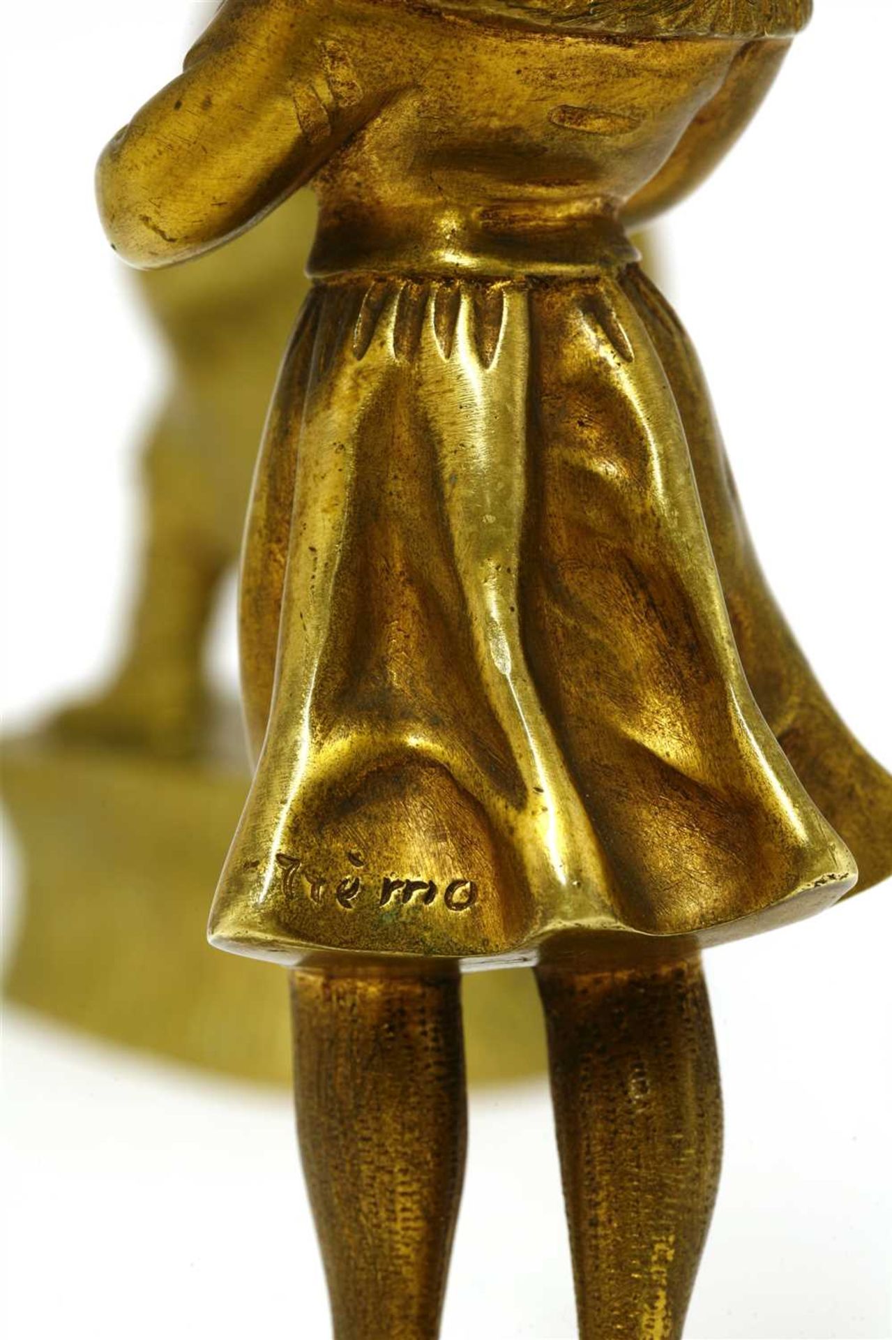 A gilt bronze and ivory figure of a girl, - Image 3 of 3