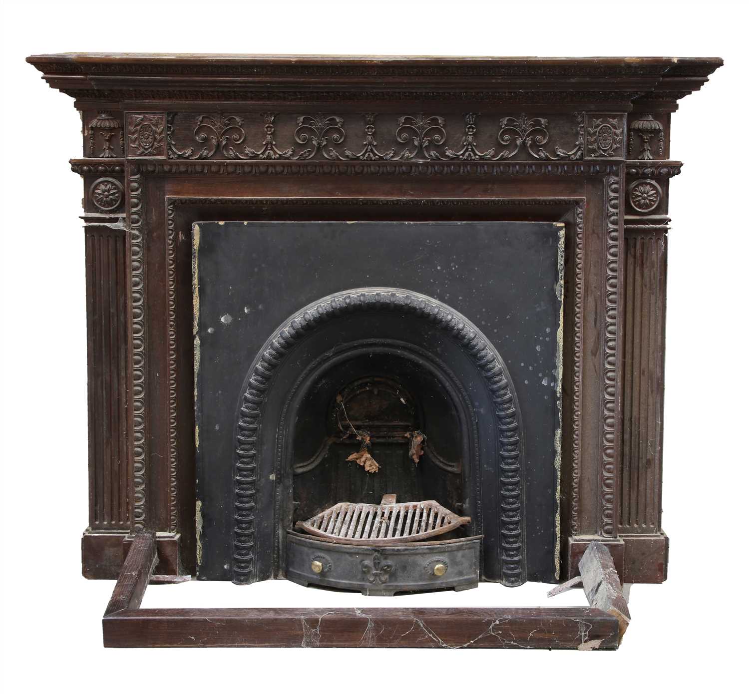 A large carved breakfront fire surround,