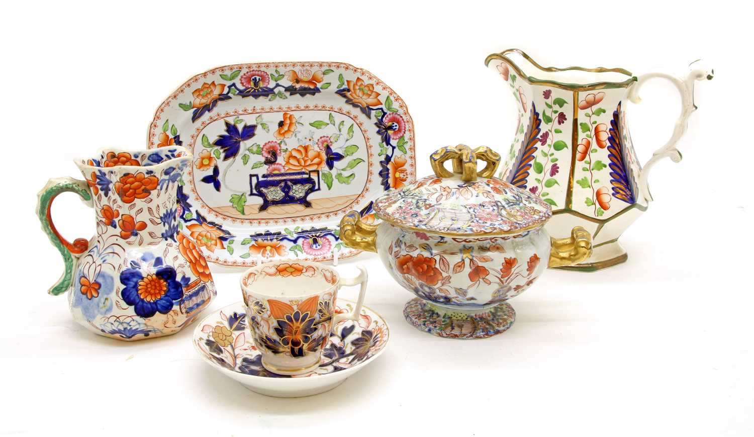 A mixed lot of 19th century ironstone pieces to include a pair of lidded tureens,