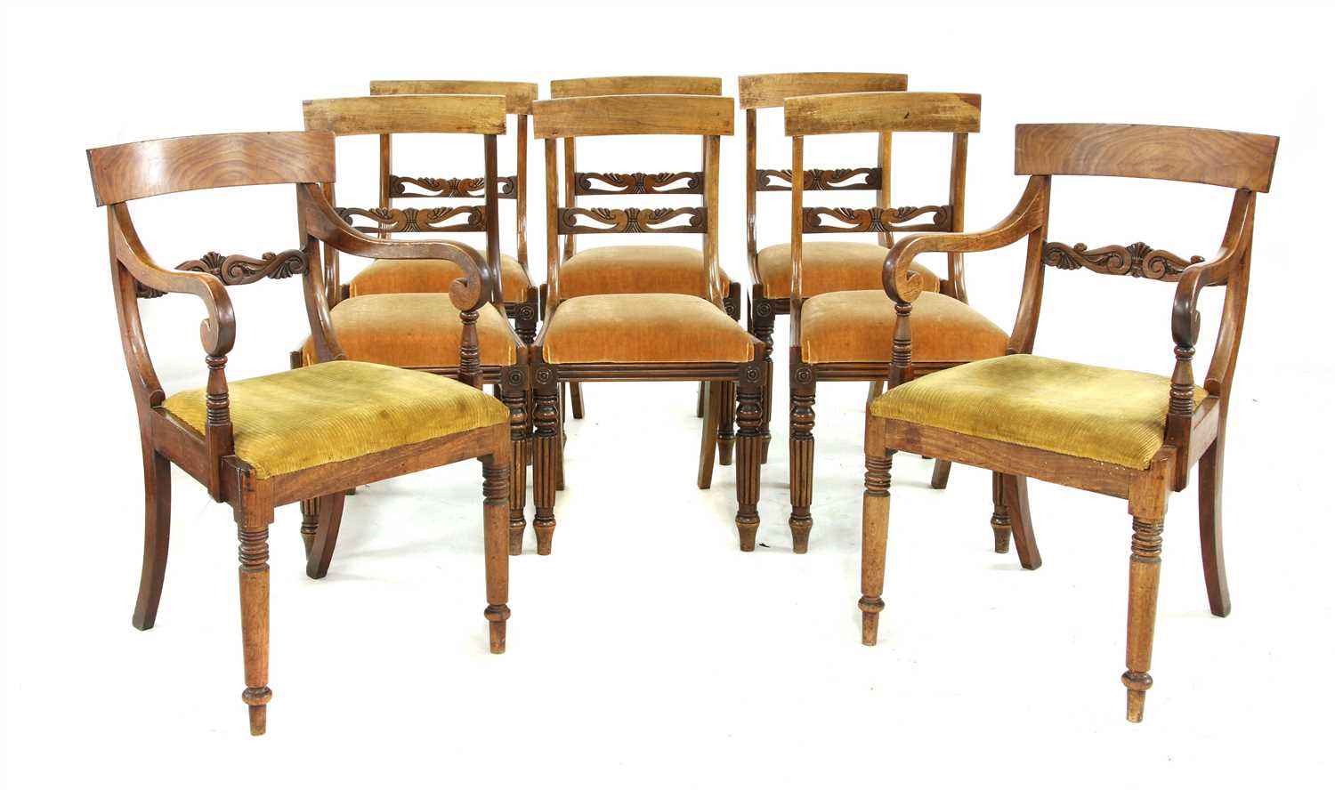 A set of eight mahogany bar backed dining chairs,