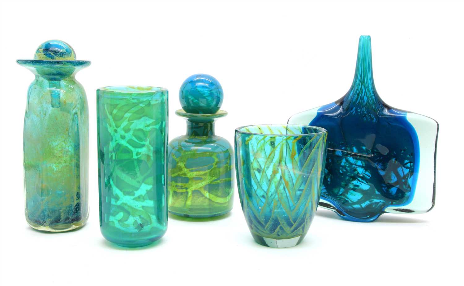 A collection of Mdina blue and yellow glassware,