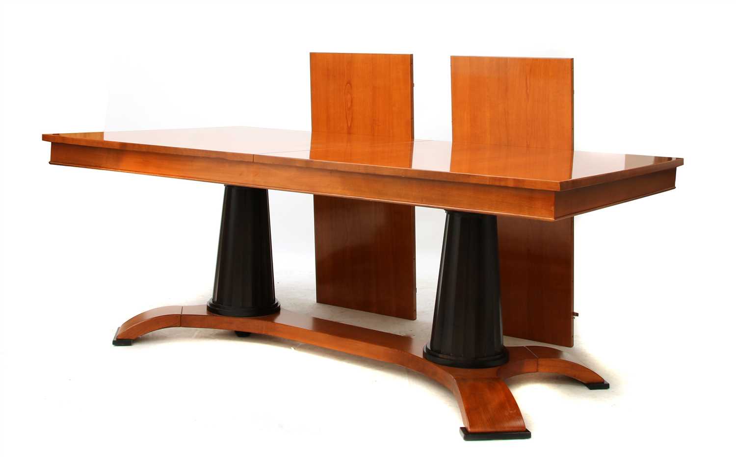 A modern selva extending dining table and chairs,