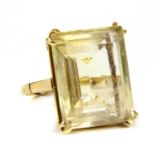 A gold single stone citrine ring,