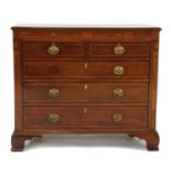 A George III mahogany boxwood inlaid and strung chest,