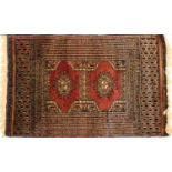 A small Persian design Belench rug,