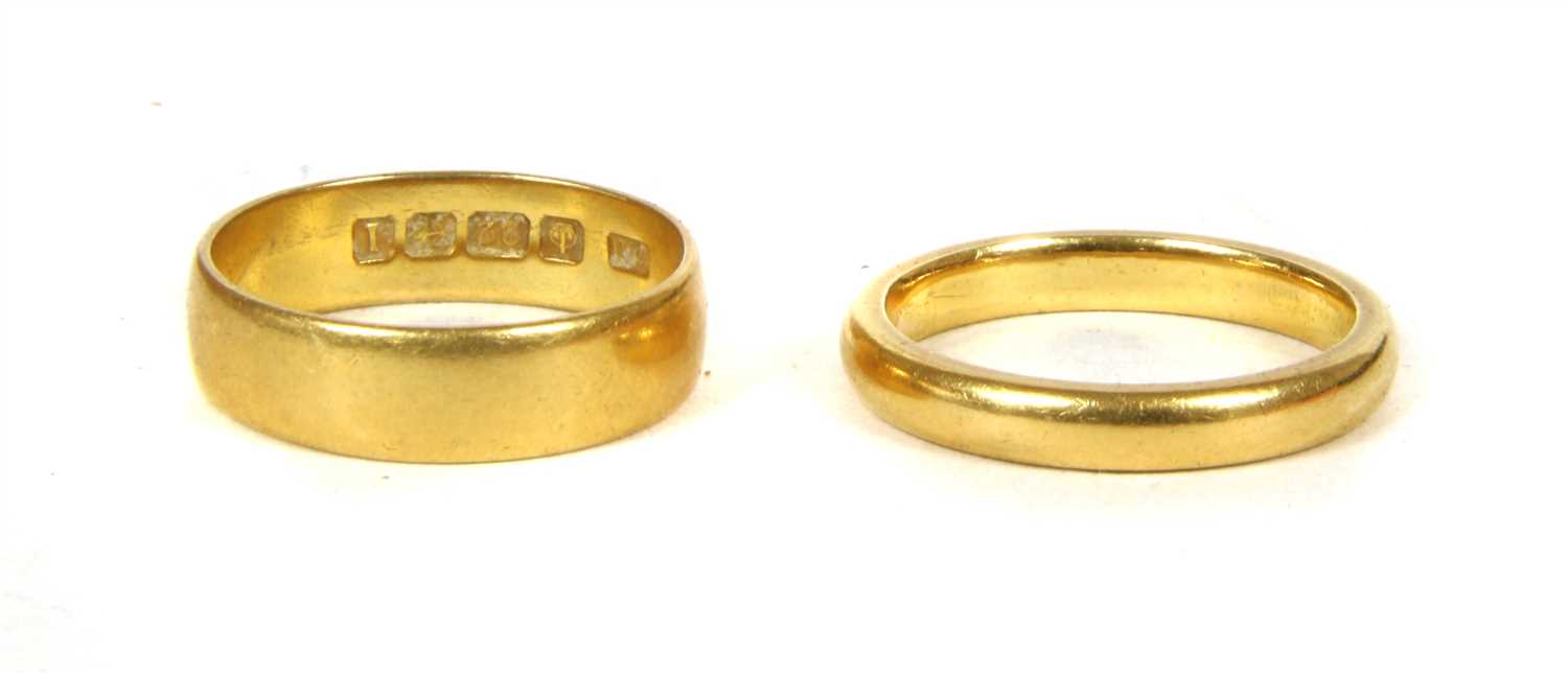 Two 22ct gold wedding rings,