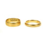 Two 22ct gold wedding rings,