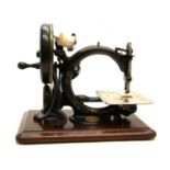 A Wilcox & Gibbs sewing machine,