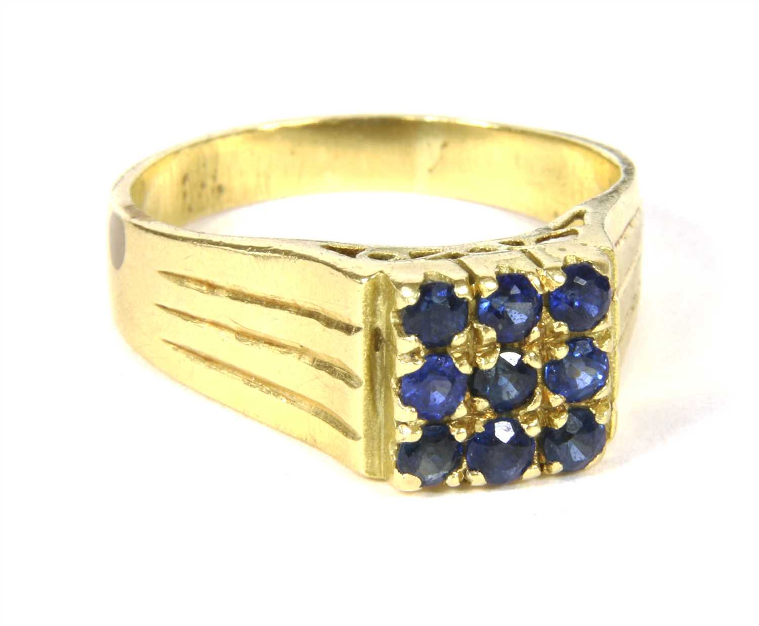 A gold sapphire ring,