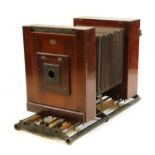 A Penrose and Co mahogany framed large plate camera,