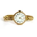 A ladies' 9ct gold mechanical bracelet watch