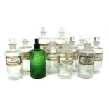 A collection of eleven glass apothecary jars