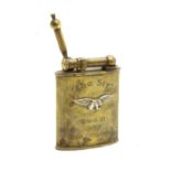 A WWII RAF Guinea Pig Club table lighter,