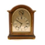 An eight day mahogany cased mantel clock,