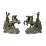 A pair of spelter figures of goddesses riding a double horse chariot,