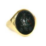 An 18ct gold oval bloodstone signet ring