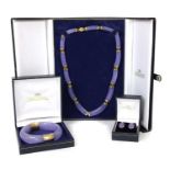 A gold dyed lavender jade necklace, bangle and earring suite,