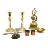 A pair of 18th century brass petal base candlesticks,