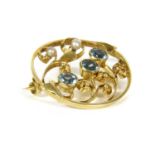 An Edwardian gold aquamarine and seed pearl brooch,