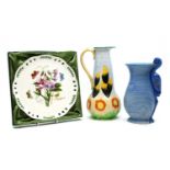 A collection of ceramic moulded jugs,