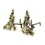 A pair of 19th century style scrolling acanthus leaf brass andirons,