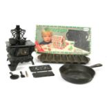 Holiday cast iron bakeware and miniature stove,