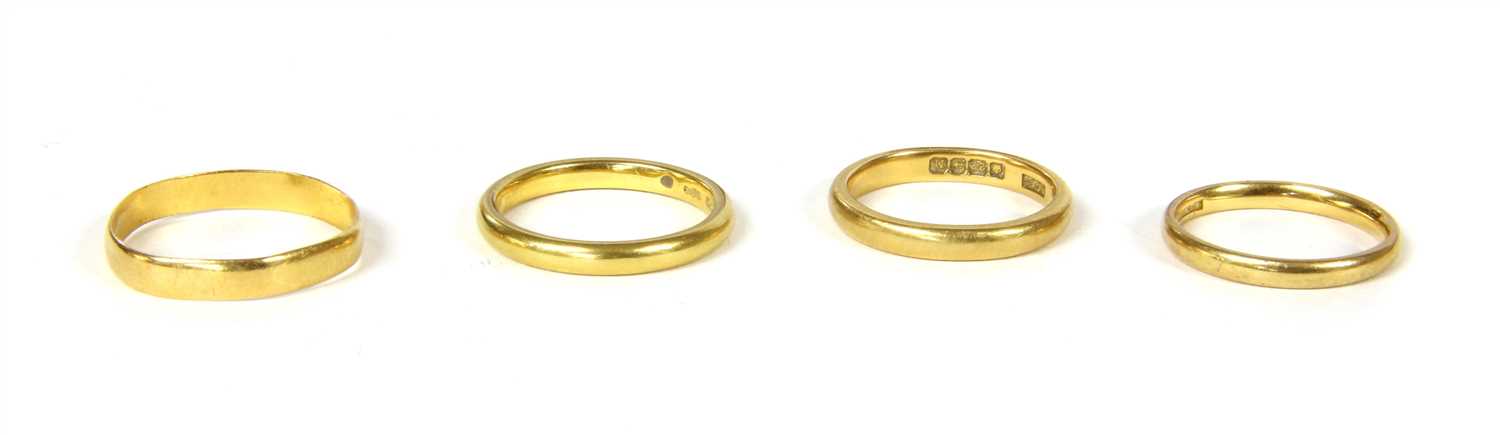 Four 22ct gold wedding rings