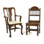 A George II style oak armchair,