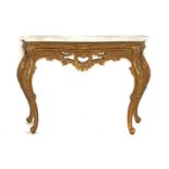 A Louis XV style gilt console table,