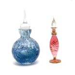 A hand blown glass scent bottle of globular form