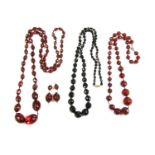 A single row graduated faceted oval plastic bead necklace,