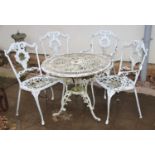 A Victorian design garden table and four chairs,