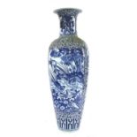 An oversized Chinese blue and white vase of baluster form,