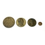 Four circular cast bronze portrait roundels,