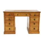 An early 20th century ash pedestal desk,