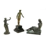 Three metal figures,