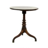 A 19th century mahogany lamp table,