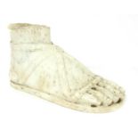 A white marble foot,