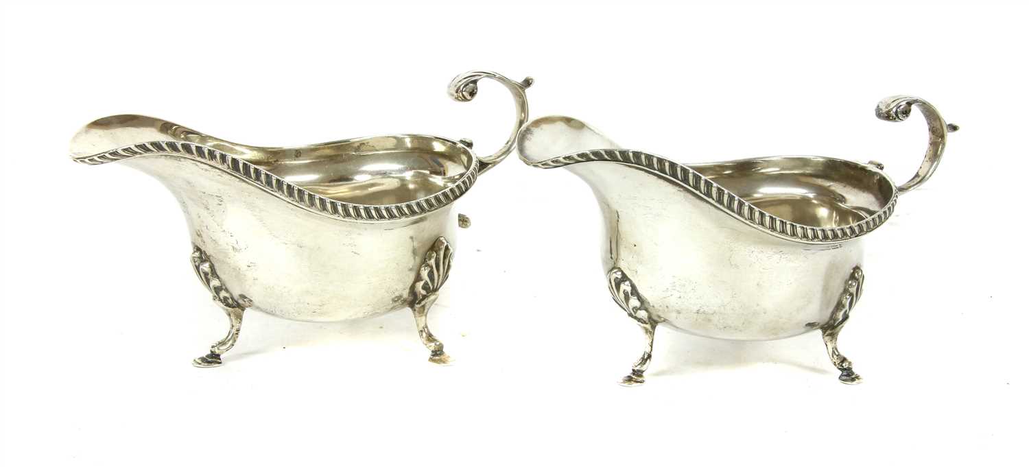 A pair of silver sauce boats,